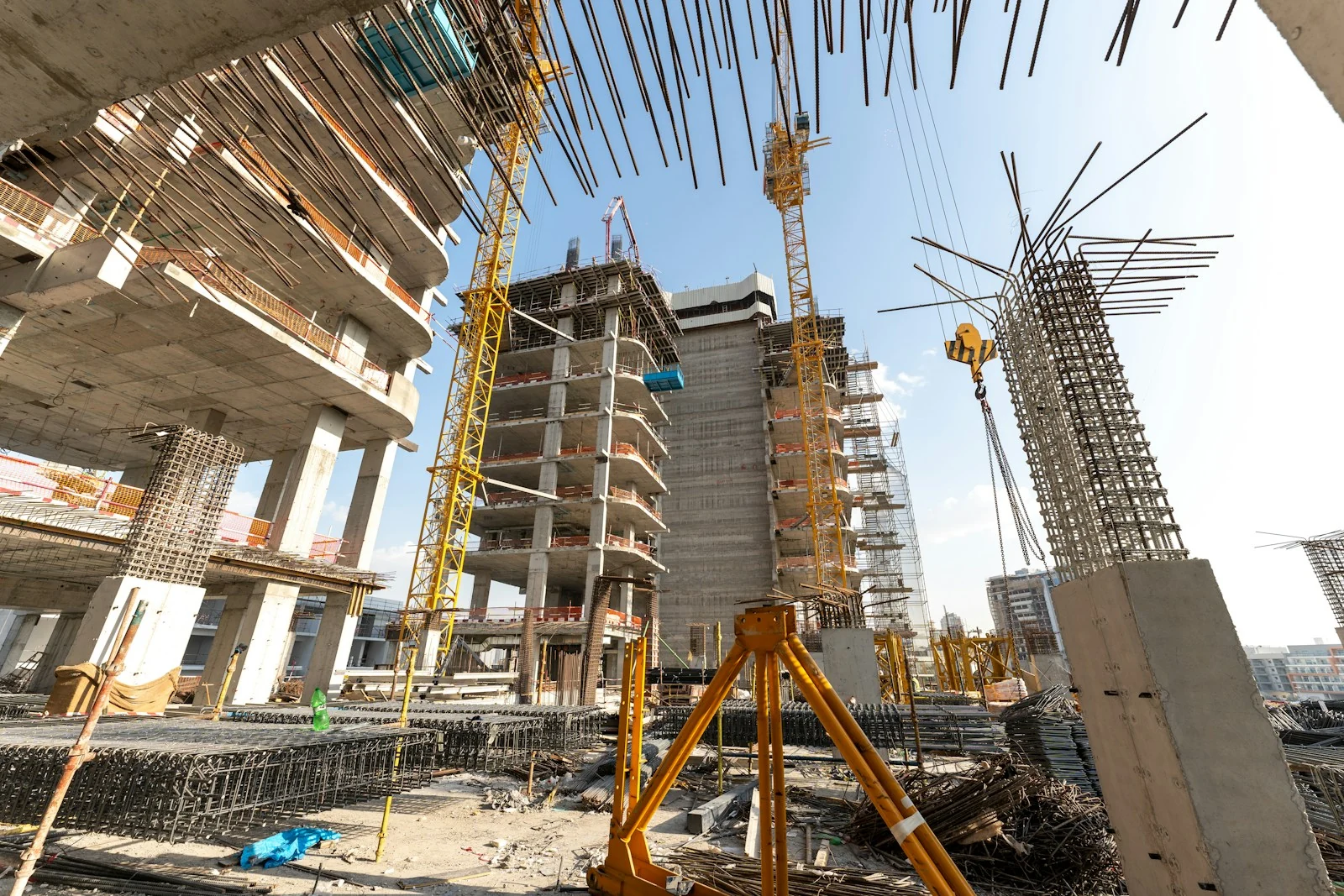 High-rise buildings under construction in Jumeirah Village Circle, photographed in April 2025